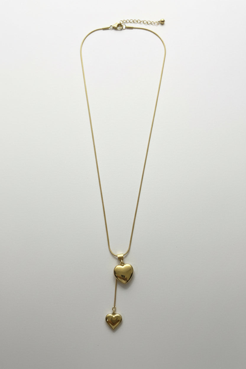 The Eternal Bond Lariat: 18k Gold-Plated Double Heart Drop for Sophisticated Layering