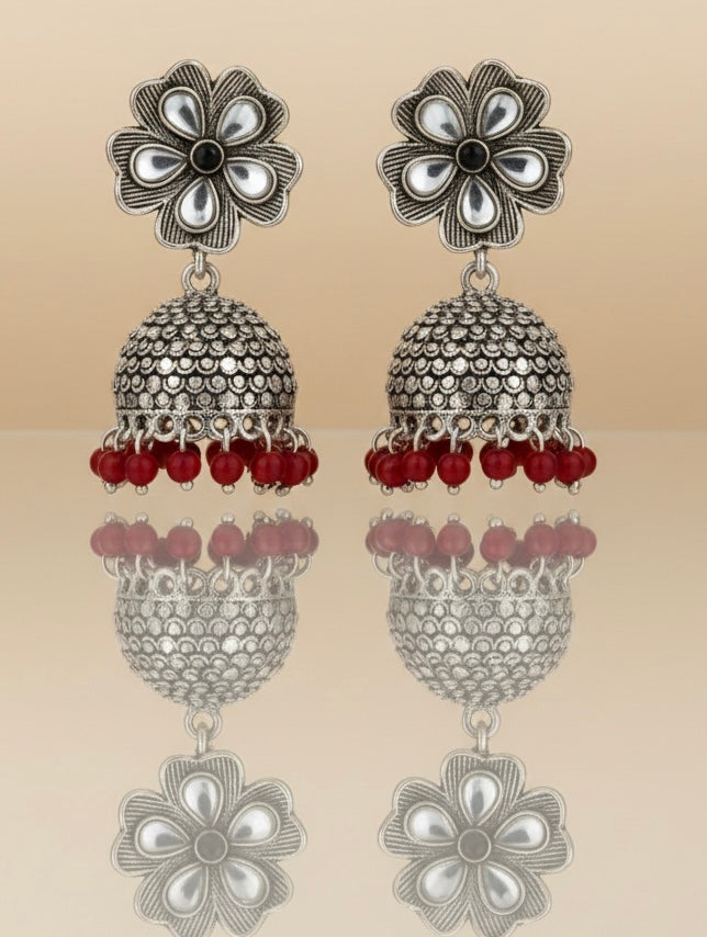Vintage Oxidized Silver Floral Jhumkas – Timeless Heritage with Ruby-Red Beaded Accents