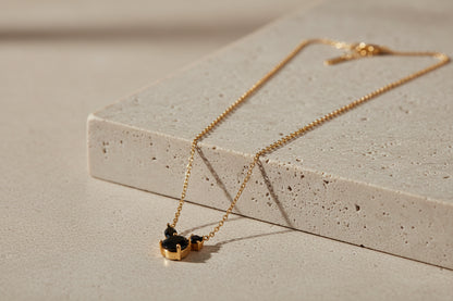 The Trio Noir Silhouette: 18k Gold Anti-Tarnish Necklace with Midnight Crystal Inlay