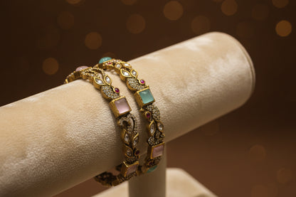 Victorian Heritage Peacock Bangle: Antique Moissanite with Pastel Flourishes